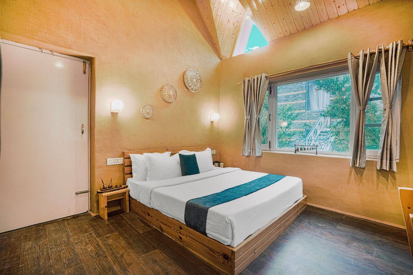 Handcrafted room interior at Anandgram Village