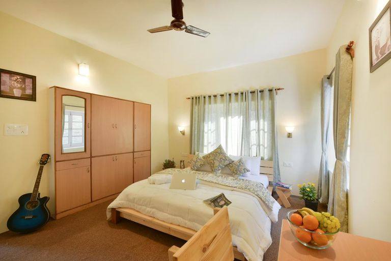 Room 402 bed and wardrobe