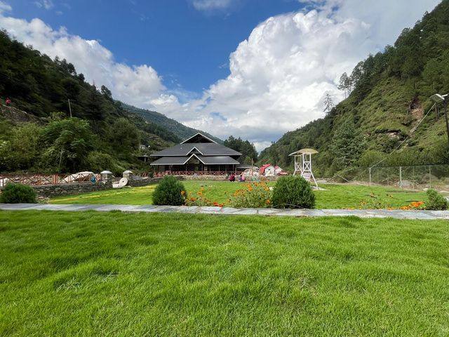 Grand lawn with the banquet hall and blue sky