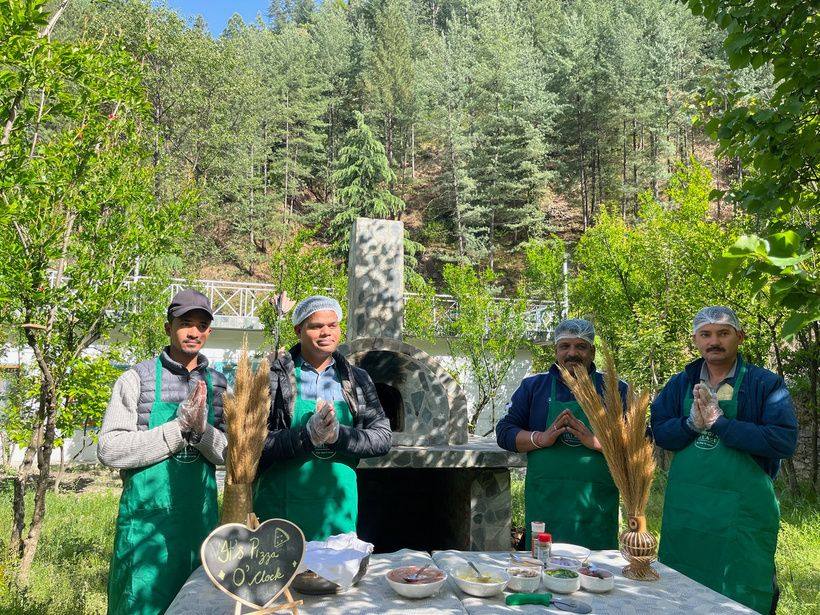 Local Himachali hosts at the clay oven