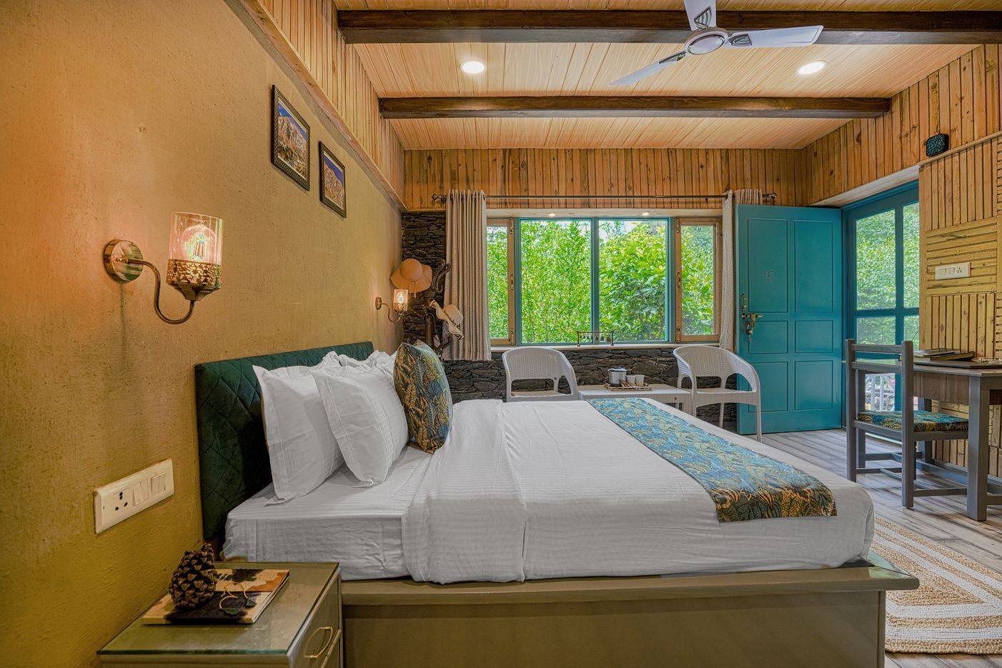 Luxury room bed with wall sconces