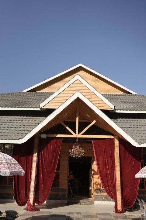 Banquet hall entrance draped in red curtains