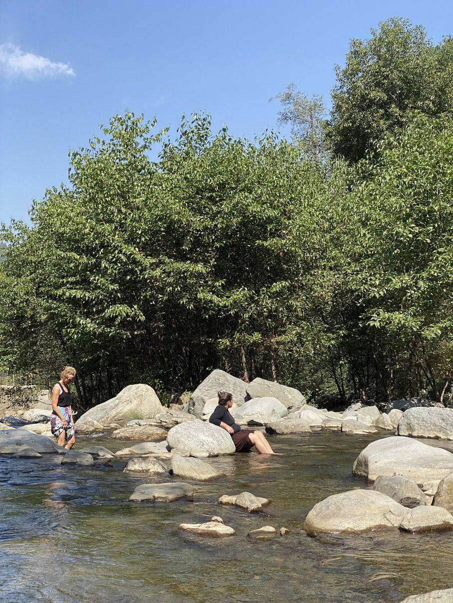 Guests by the rocky river pool